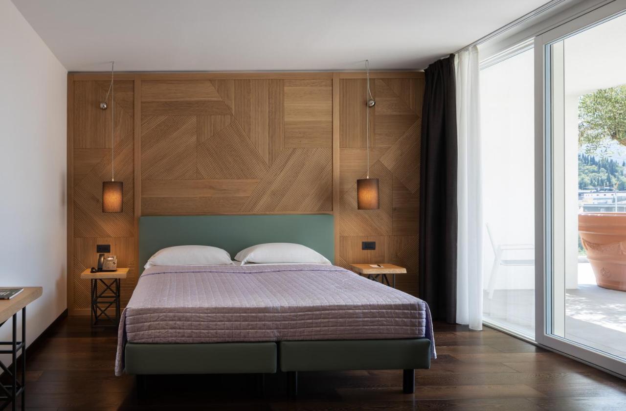 Aris Apartments & Sky Pool - Tonelli Hotels - Adult Friendly Рива-дель-Гарда Екстер'єр фото